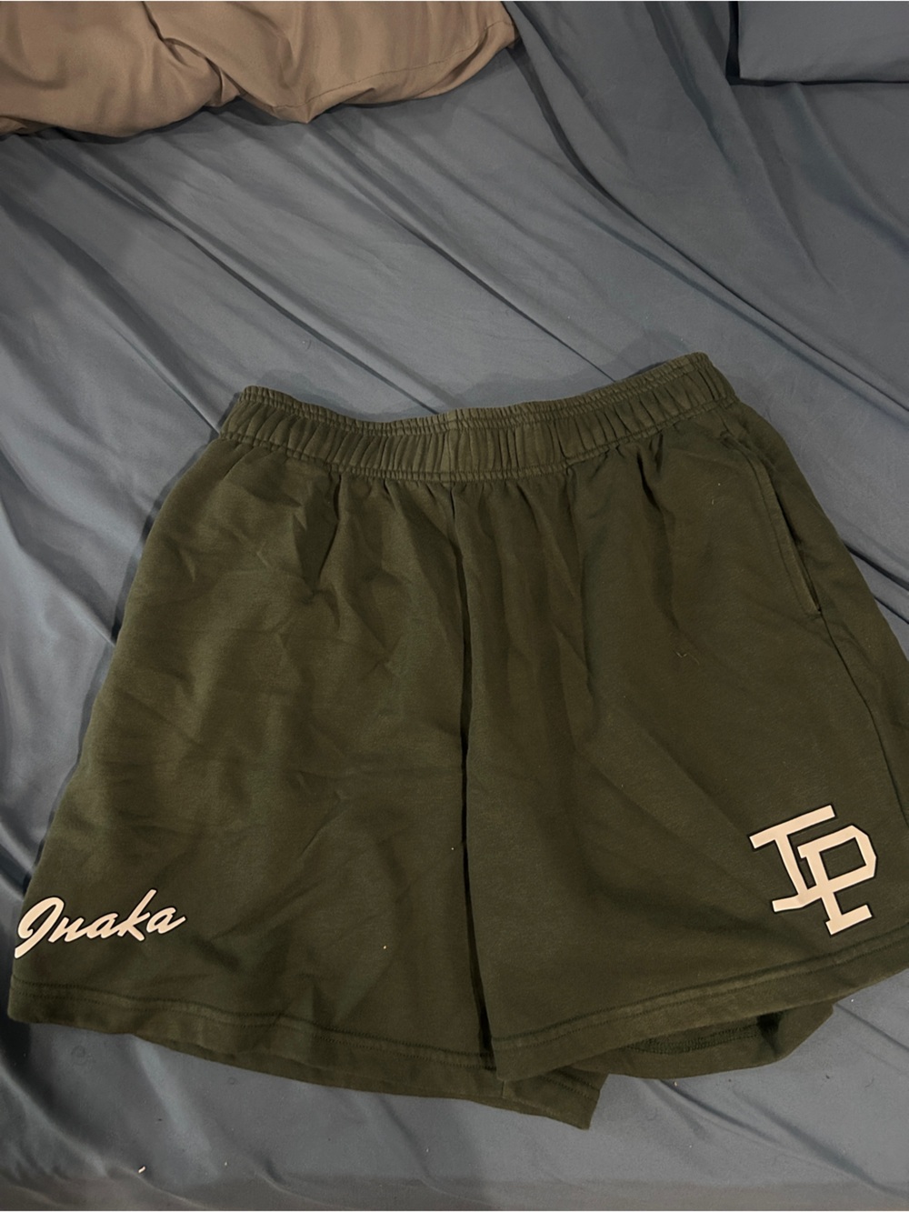 Inaka Power Olive Green Athletic Shorts with White Logo